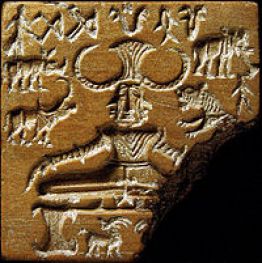 “Shiva Pashupati” by unknown Indus Valley Civilization sealmaker from Mohenjodaro archaeological site – Licensed under Public Domain via Wikimedia Commons.
